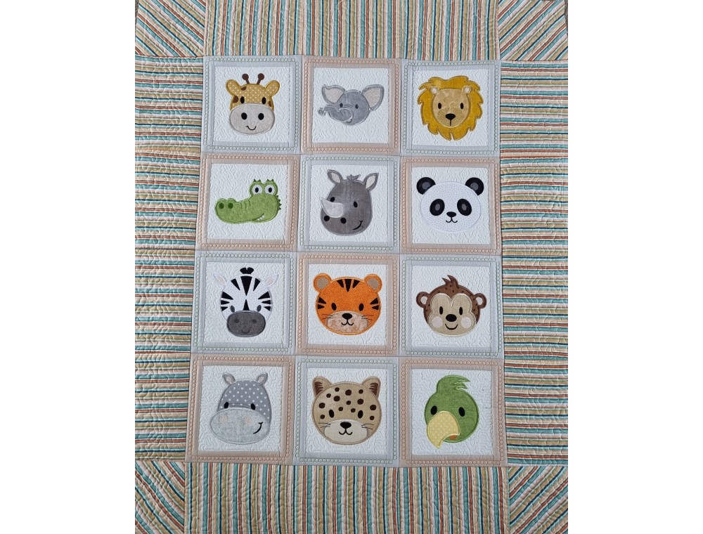 Animal faces baby quilt