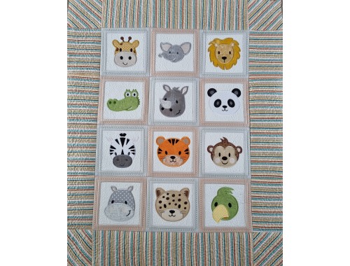 Animal faces baby quilt
